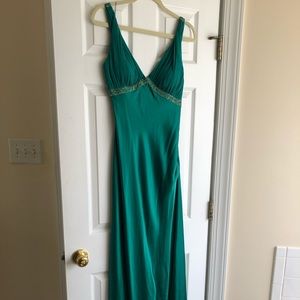 Emerald green silk gown with scooped back
